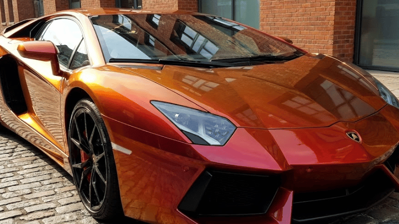 a red-orange Chameleon Car Wrap
