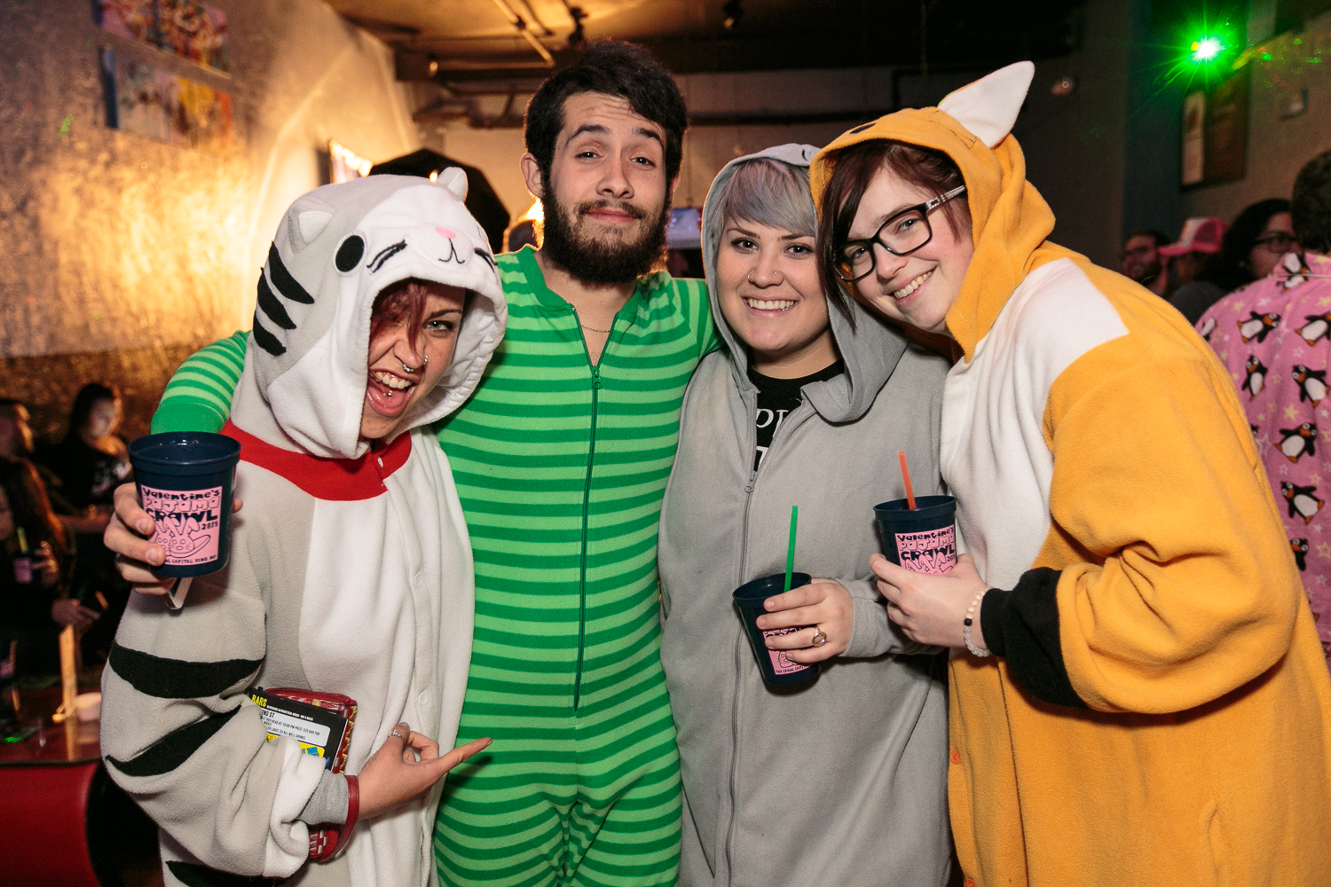 Group of friends wearing Kigurumi during their late night party