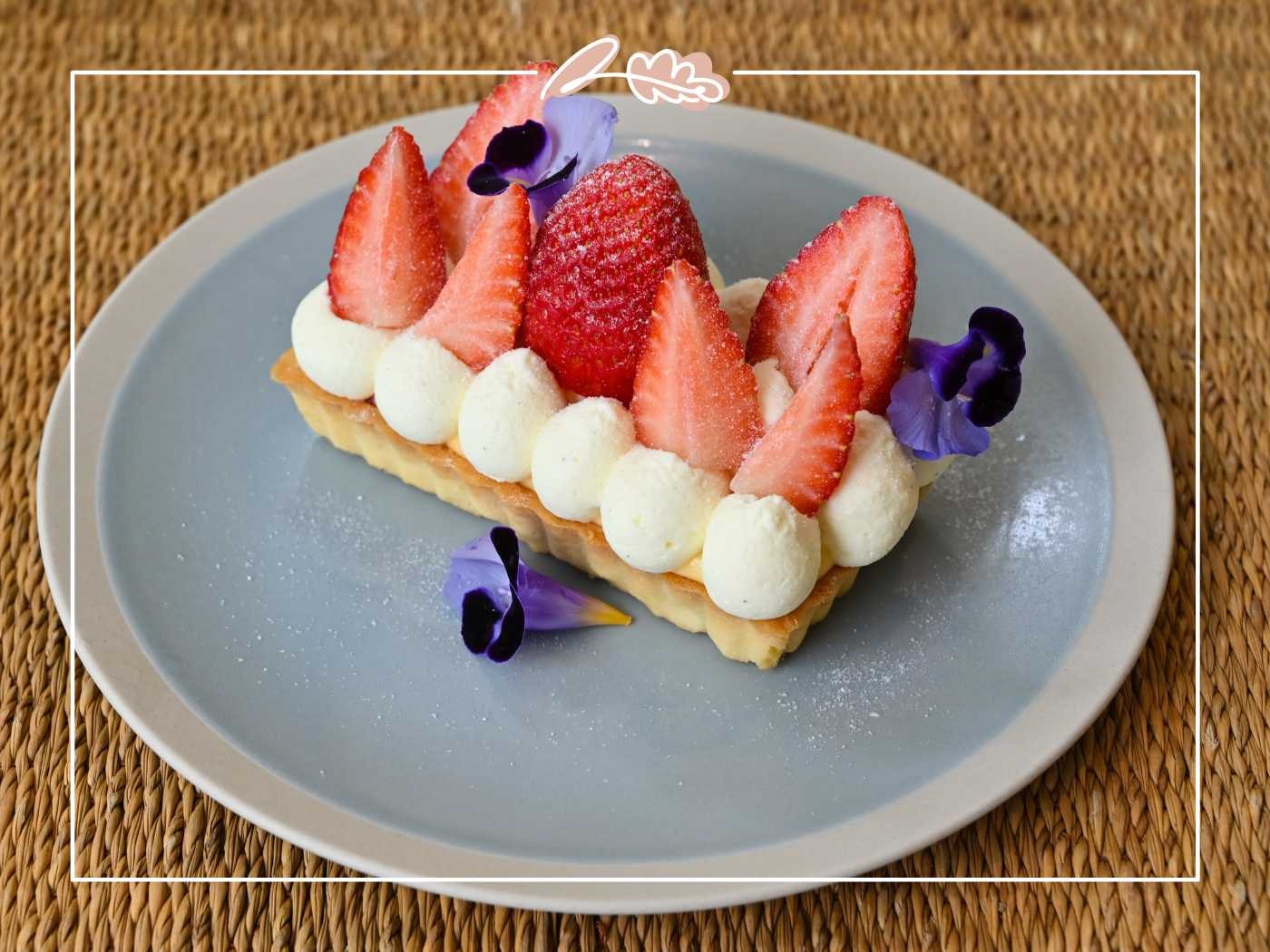 Strawberry and cream dessert garnished with edible flowers by Fabulous Flowers and Gifts