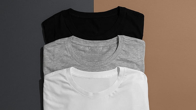 Cotton harvesting in field showing natural fiber source for cotton shirts