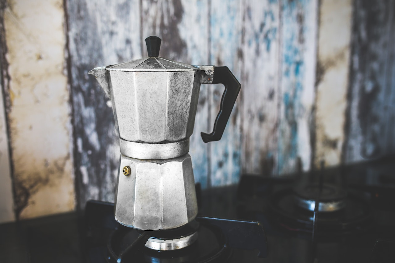 A traditional metal stovetop coffee maker