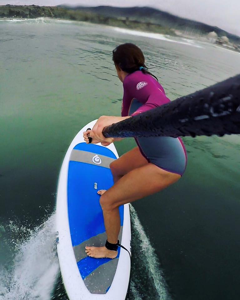 feet shoulder width apart and left elbow helps with paddle strokes