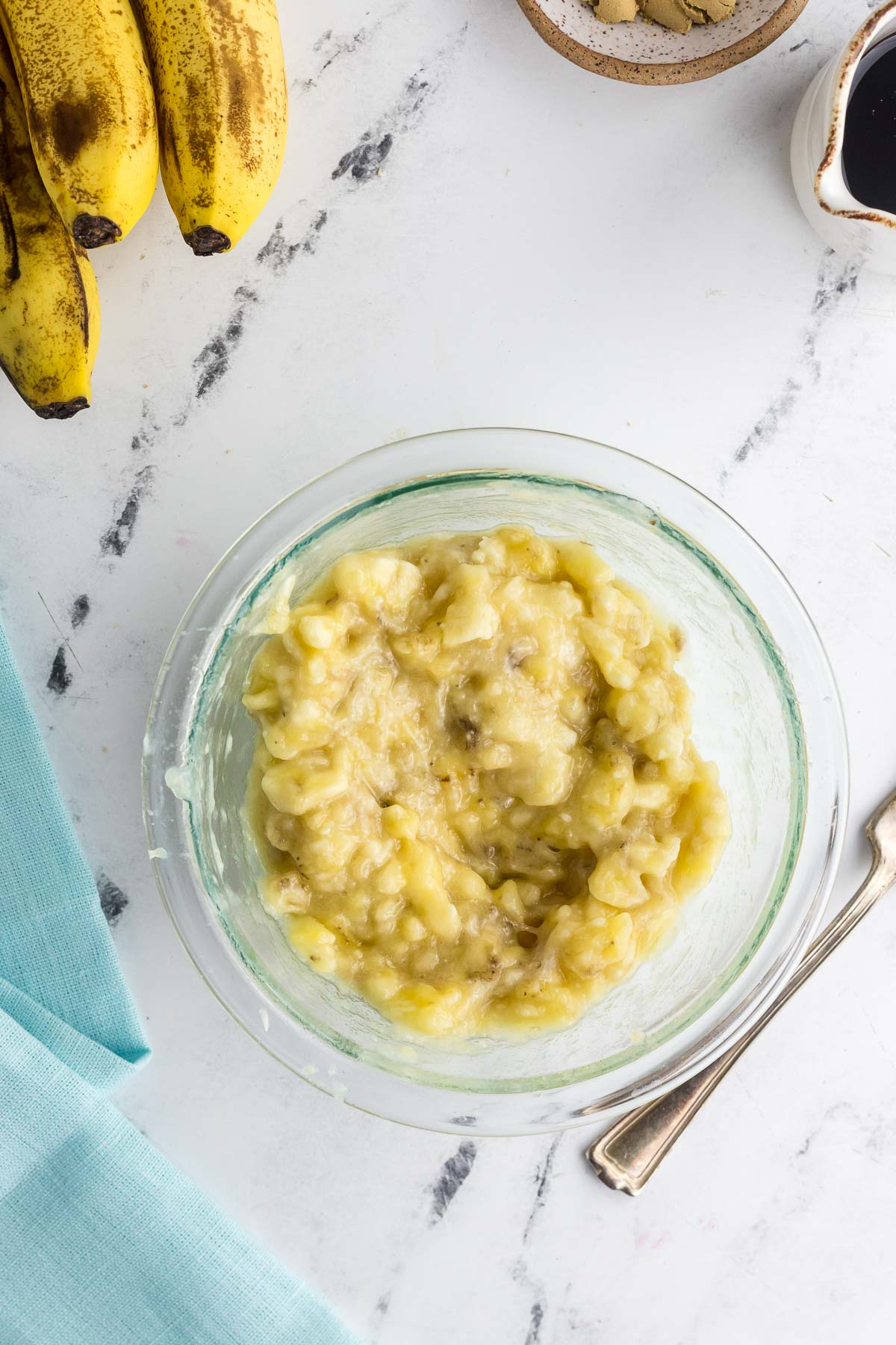 mashed bananas in small bowl