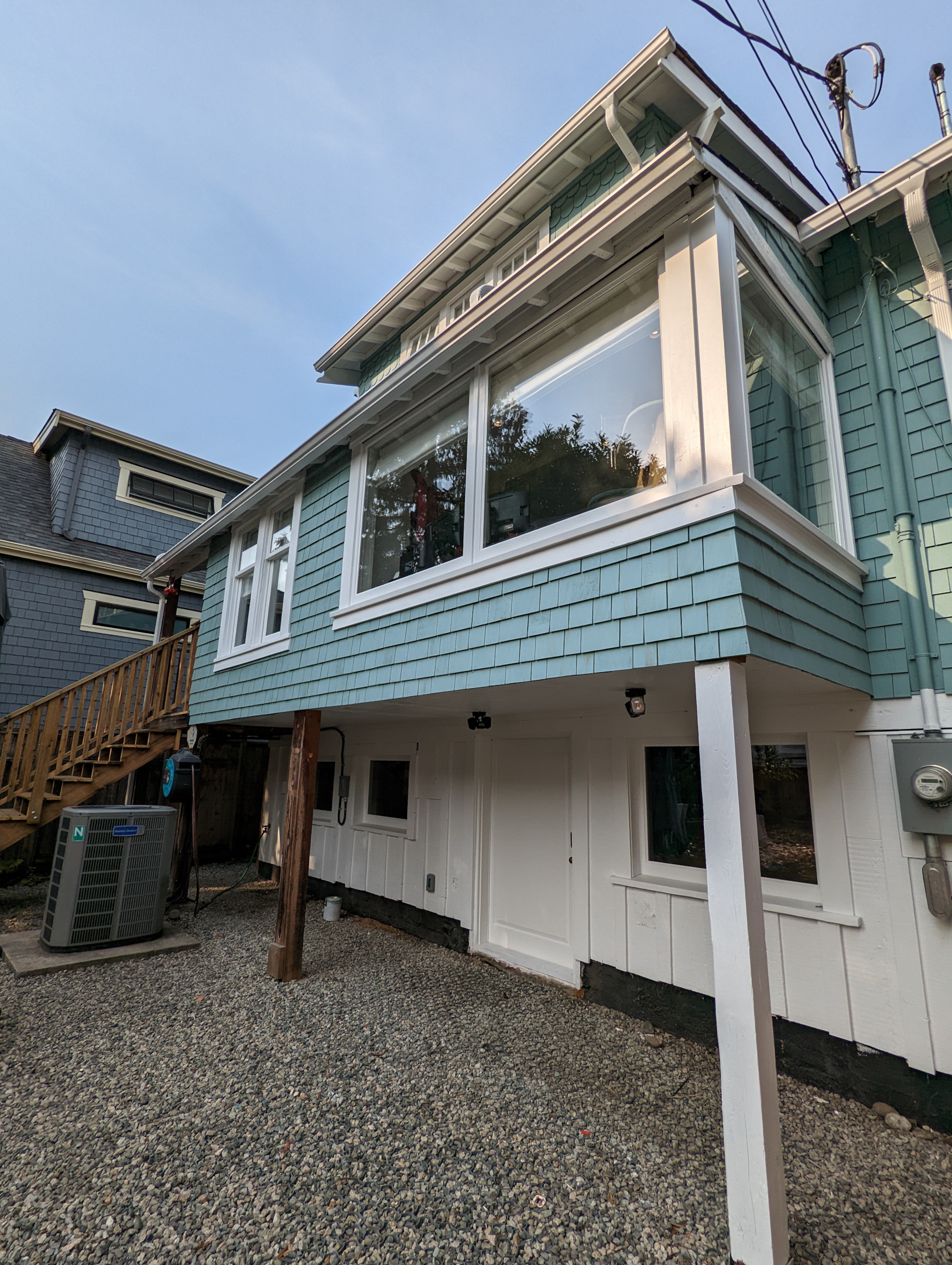 Proudly Renaissance Paint and Carpentry project: Siding restoration + rebuild stairs in Kitsilano 