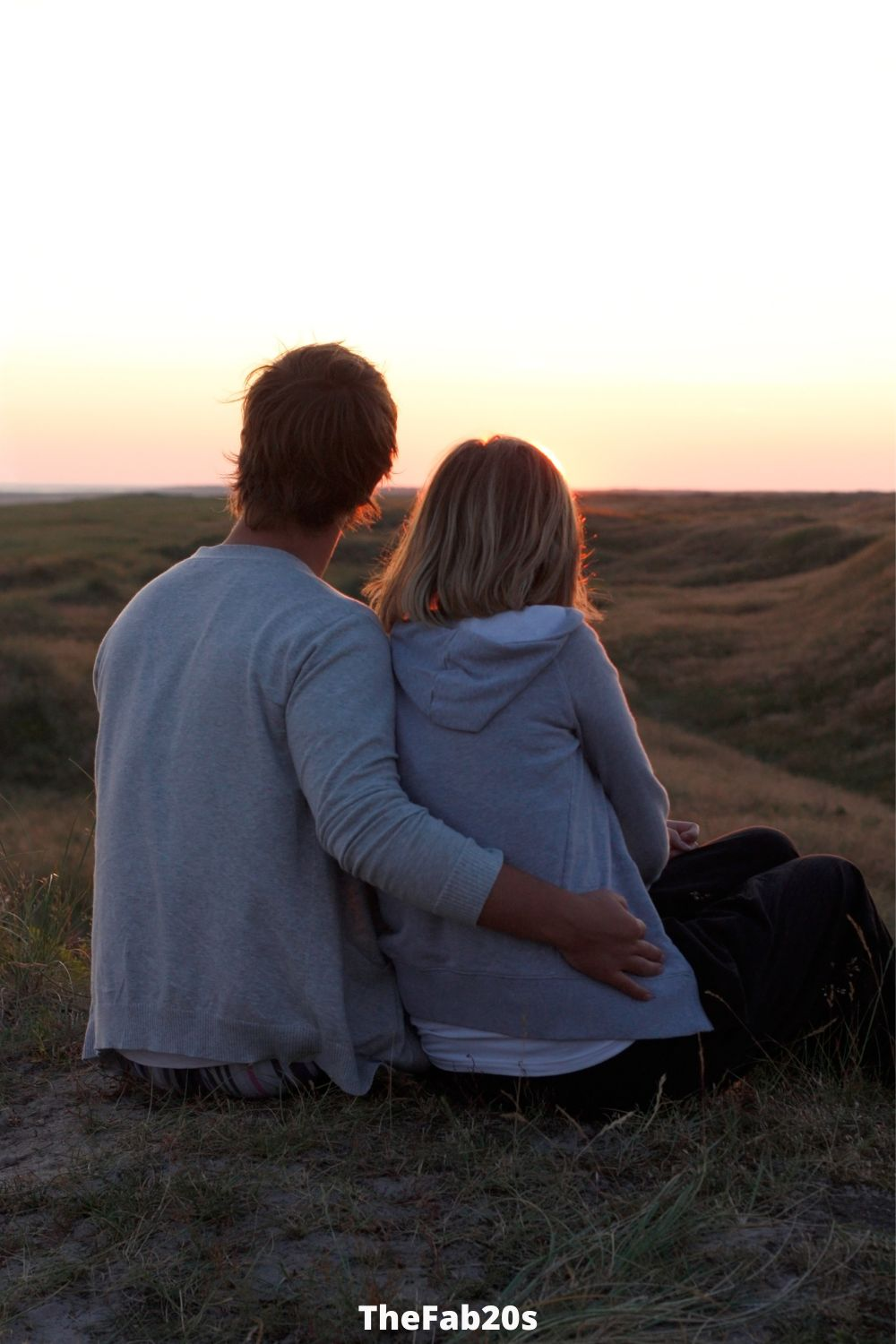 Couple looking off to the distance - Featured in Cancer and Sagittarius compatibility Article 