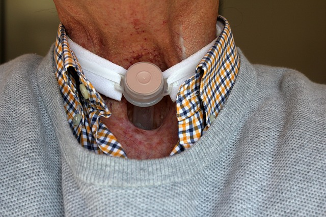 An image of a man after surgery for vocal cord issues. 