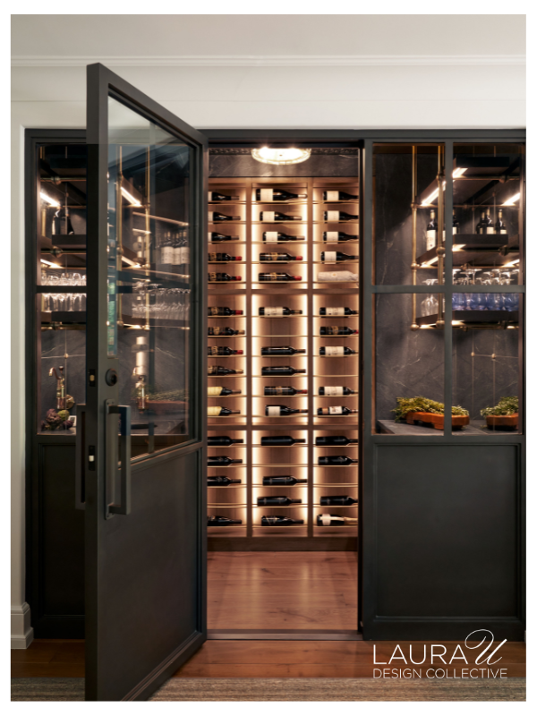 Custom wine cellar with floor-to-ceiling wood wine racks illuminated by integrated LED lighting.