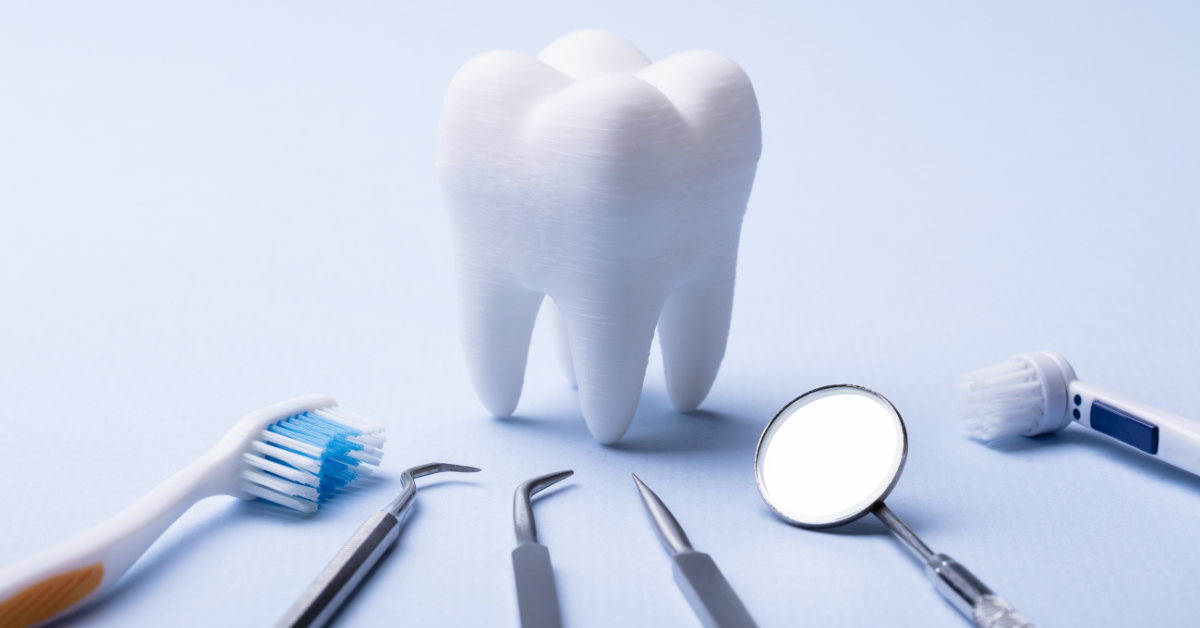 An image of dental tools surrounding a physical representation of a tooth, illustrating the power of white space.