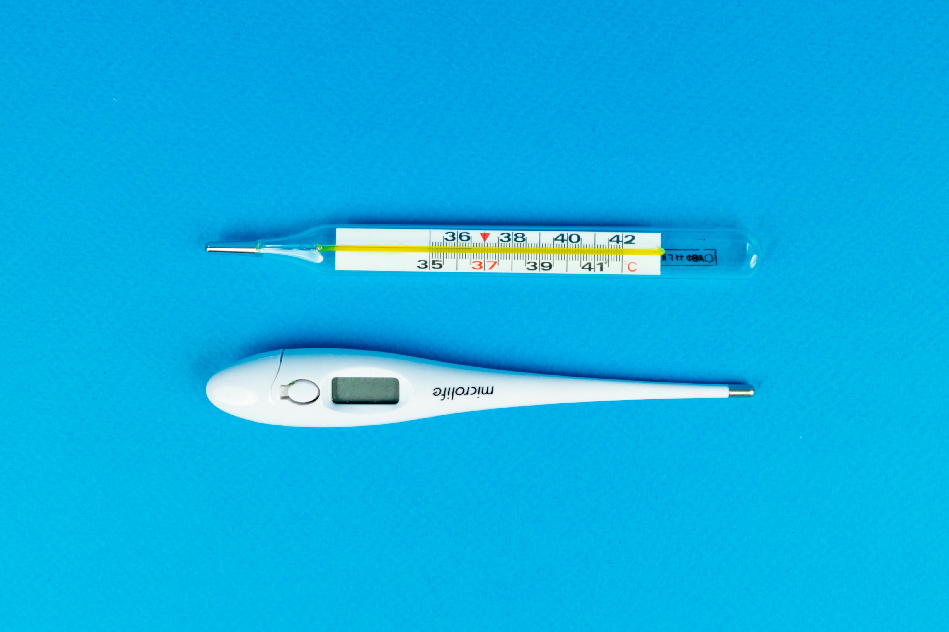 Digital and mercury thermometers for precise temperature checks.