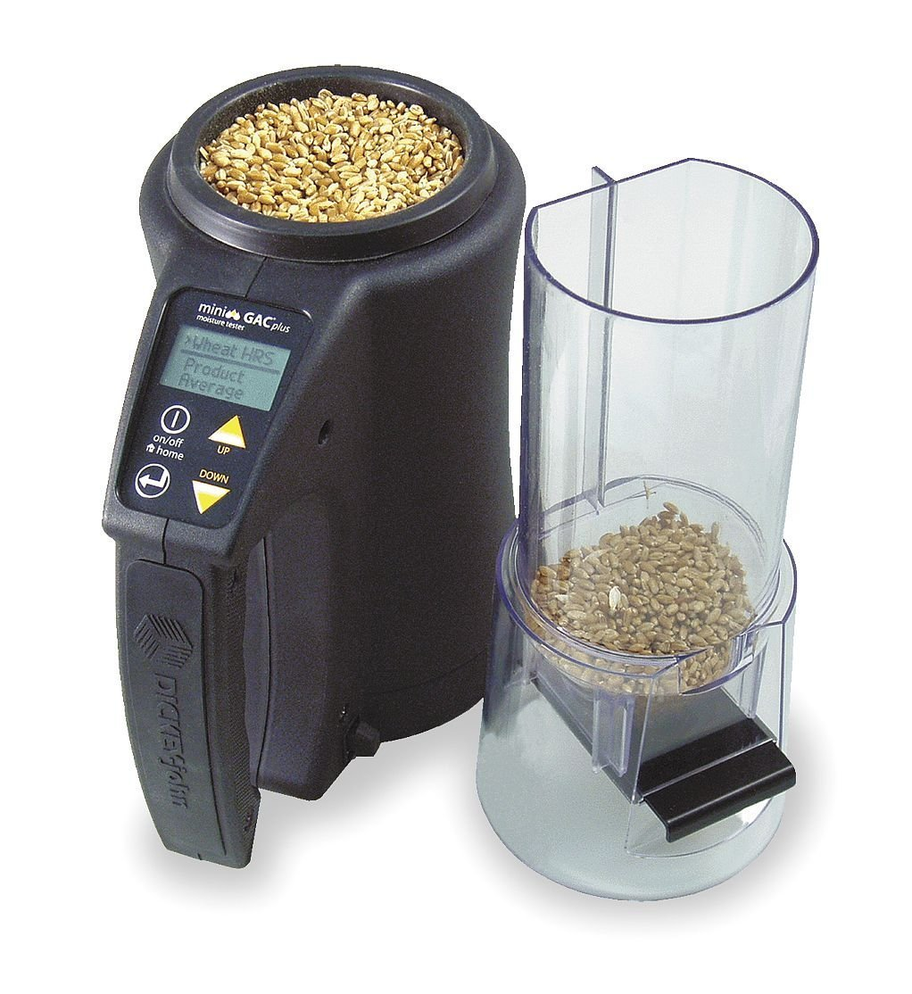 A grain moisture tester used to measure test weight and moisture content in grain