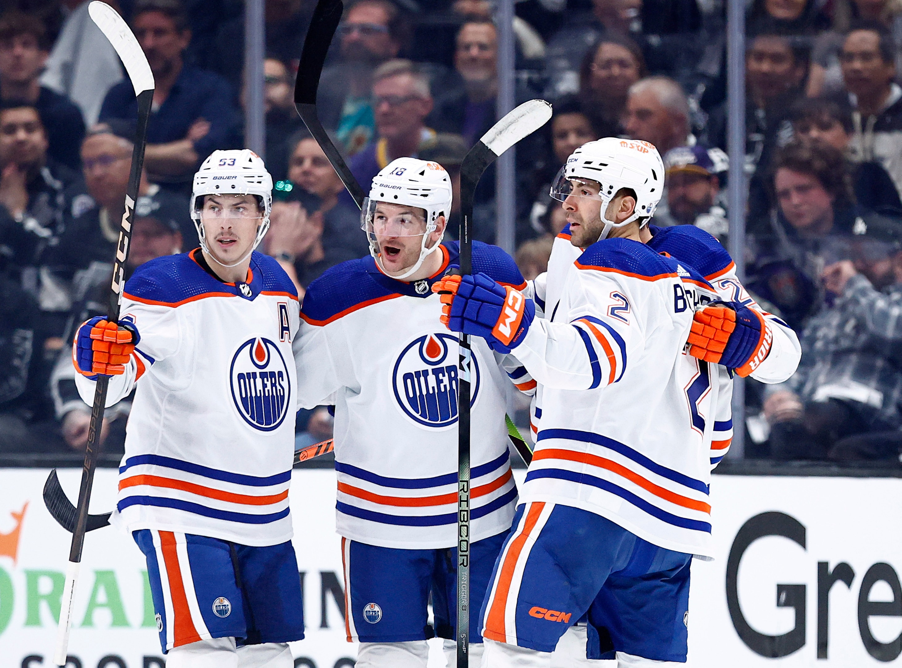 Ryan Nugent-Hopkins, Zach Hyman, Leon Draisaitl and Evan Bouchard of the Edmonton Oilers celebrate a power play goal against the Los Angeles Kings in the first round of the 2024 Stanley Cup Playoffs on April 28, 2024 in Los Angeles, California.