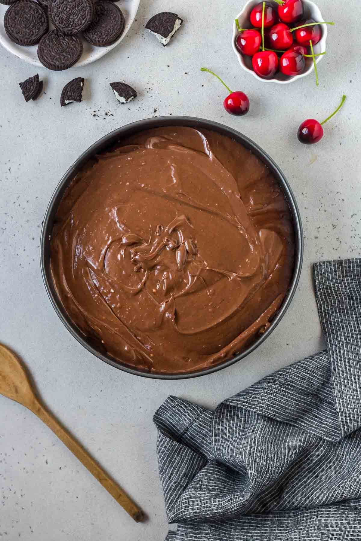 unbaked chocolate cheesecake in springform pan