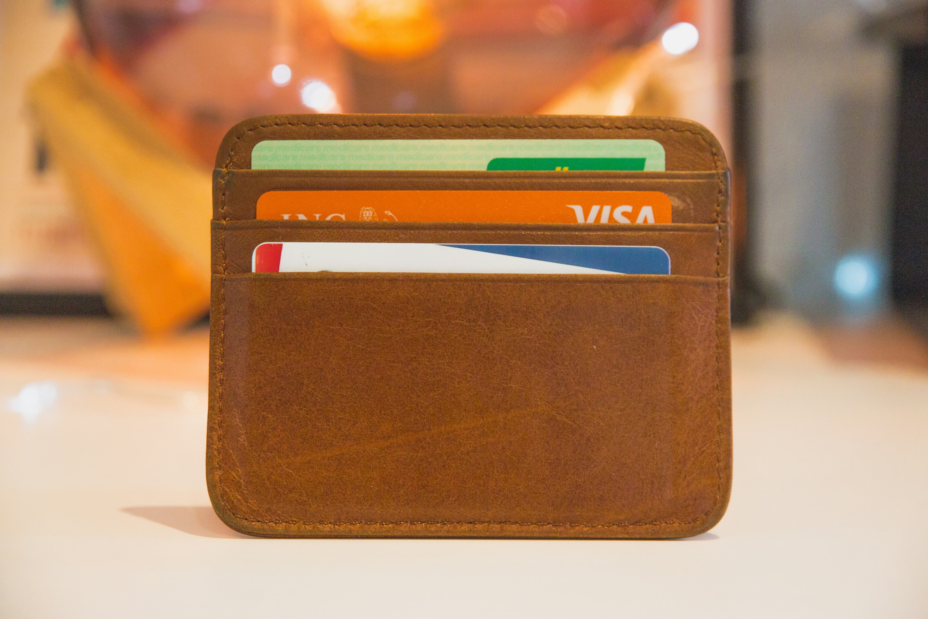 Wallet of hard money lender containing credit cards and bank cards.