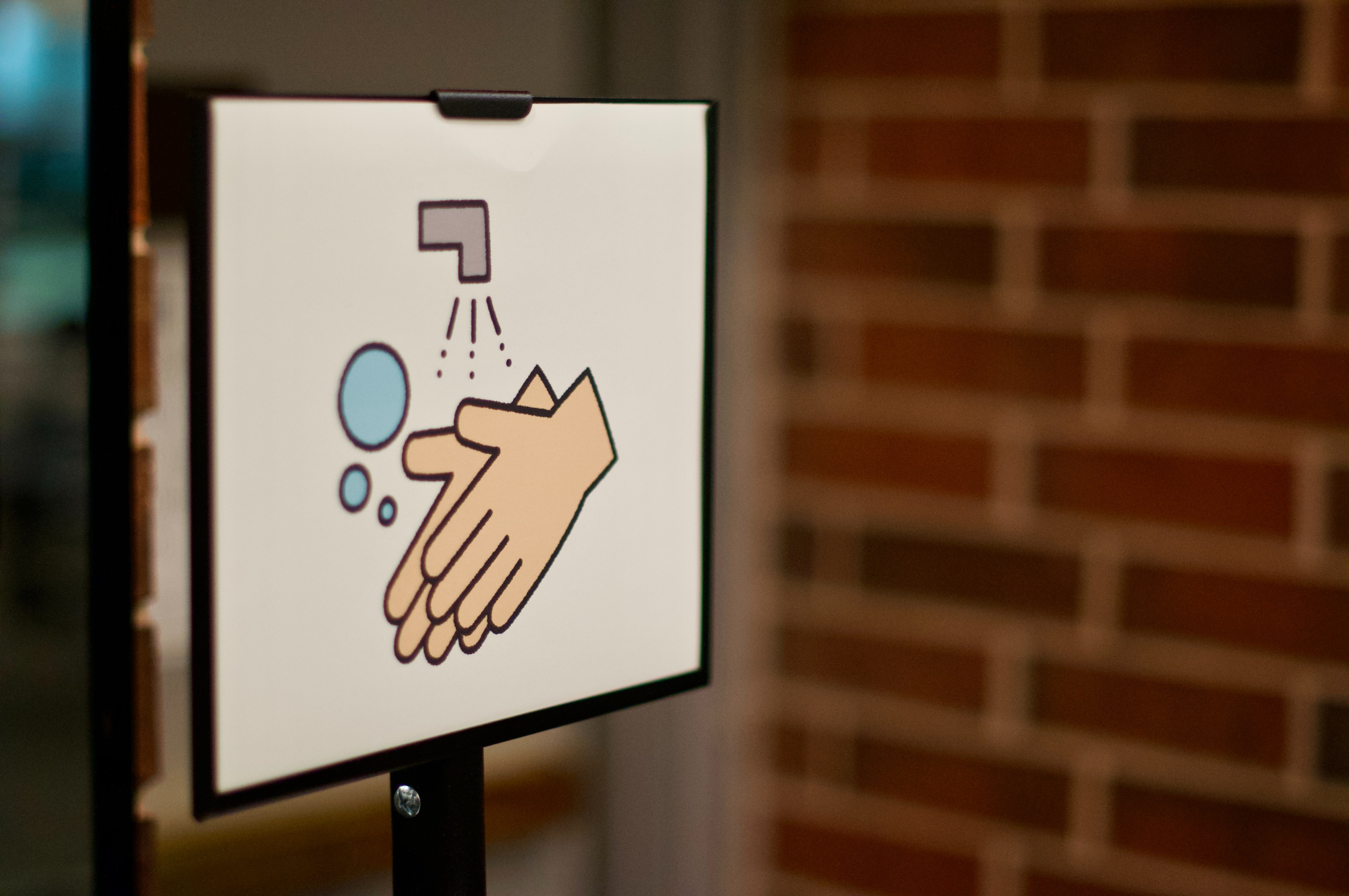 Face to Face Events Back on Track | Photo of a printed sign that features handwashing icon. | Image Link: https://images.unsplash.com/photo-1612125033189-3a4950acc118?ixlib=rb-1.2.1&ixid=MnwxMjA3fDB8MHxwaG90by1wYWdlfHx8fGVufDB8fHx8&auto=format&fit=crop&w=874&q=80