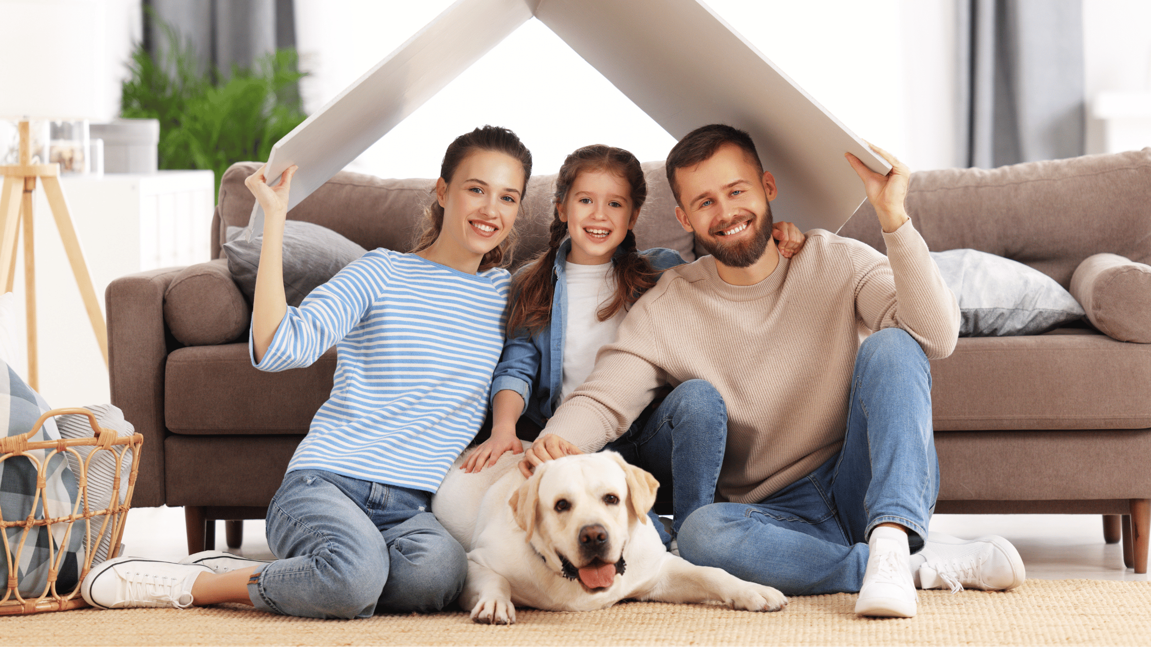 family with dog at home
