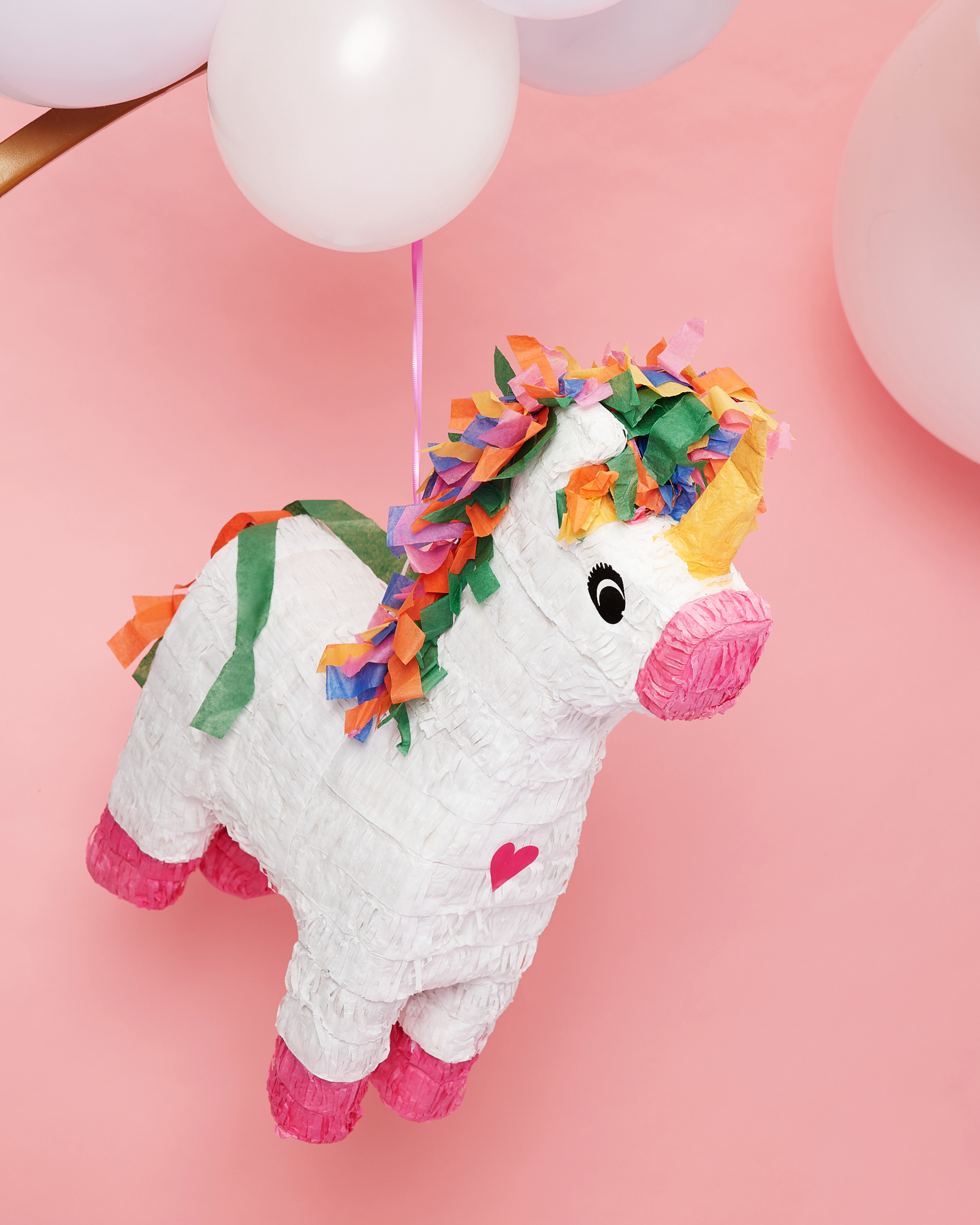 Unicorn birthday party piñata.