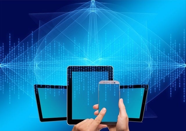 Multiple digital devices including a tablet and smartphone, surrounded by binary data and digital network design.