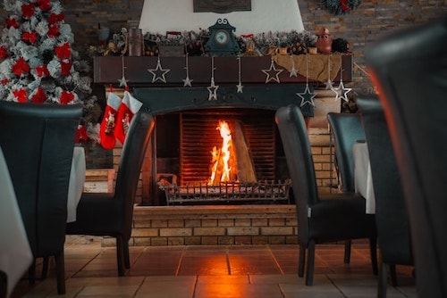 Stay warm in cozy rooms, and get your feet warm next to a fire in a cute restaurant
