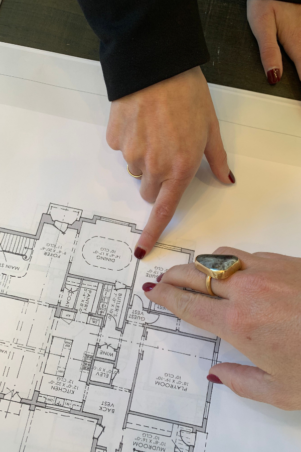 the LUDC team looking at blueprints