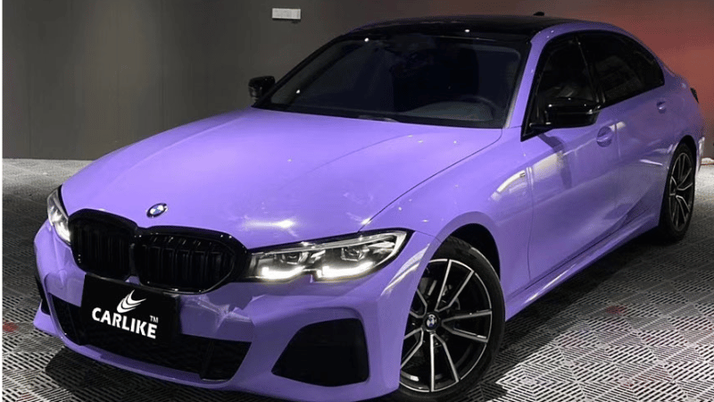 A BMW in purple vinyl wrap