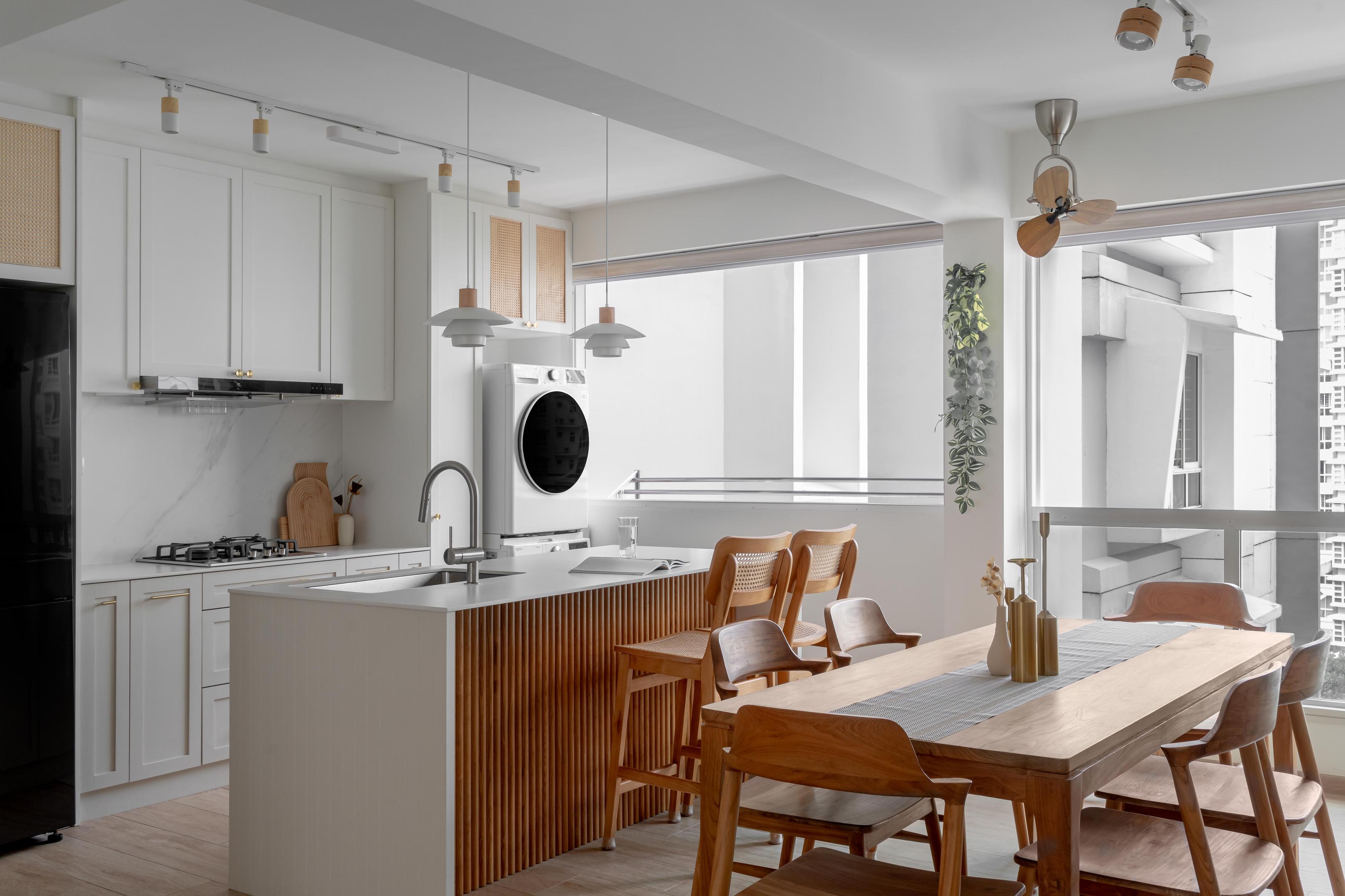 The image depicts a warm and inviting modern condominium living room featuring rich wood finishes, a soft sofa, and lush indoor plants, all bathed in natural light. This aesthetically pleasing space showcases the latest interior design trends, creating a comfortable environment perfect for relaxation.