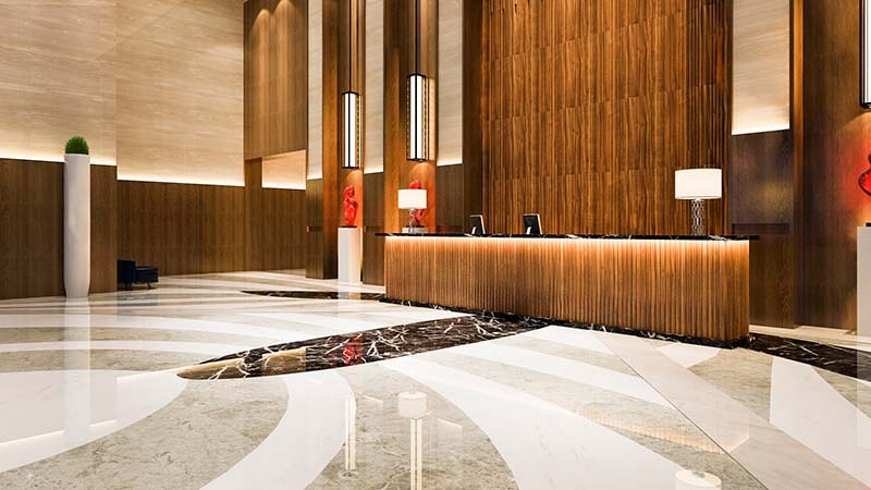 Modern hotel lobby with a freshly mopped floor