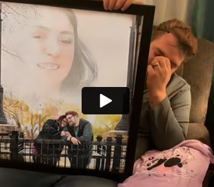 Video preview of man crying while holding a portrait