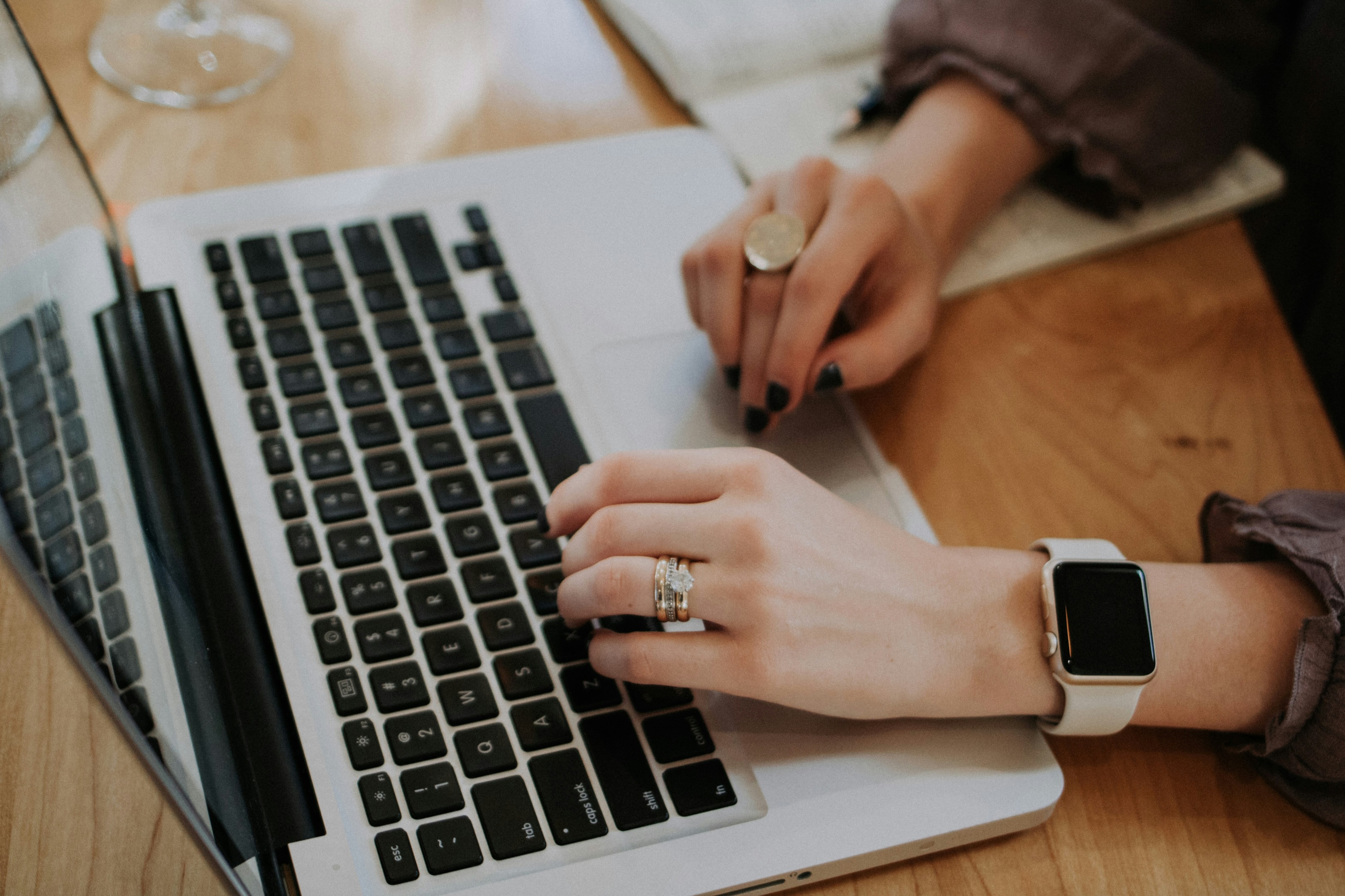 Real estate investor works on SMS campaign for her business.
