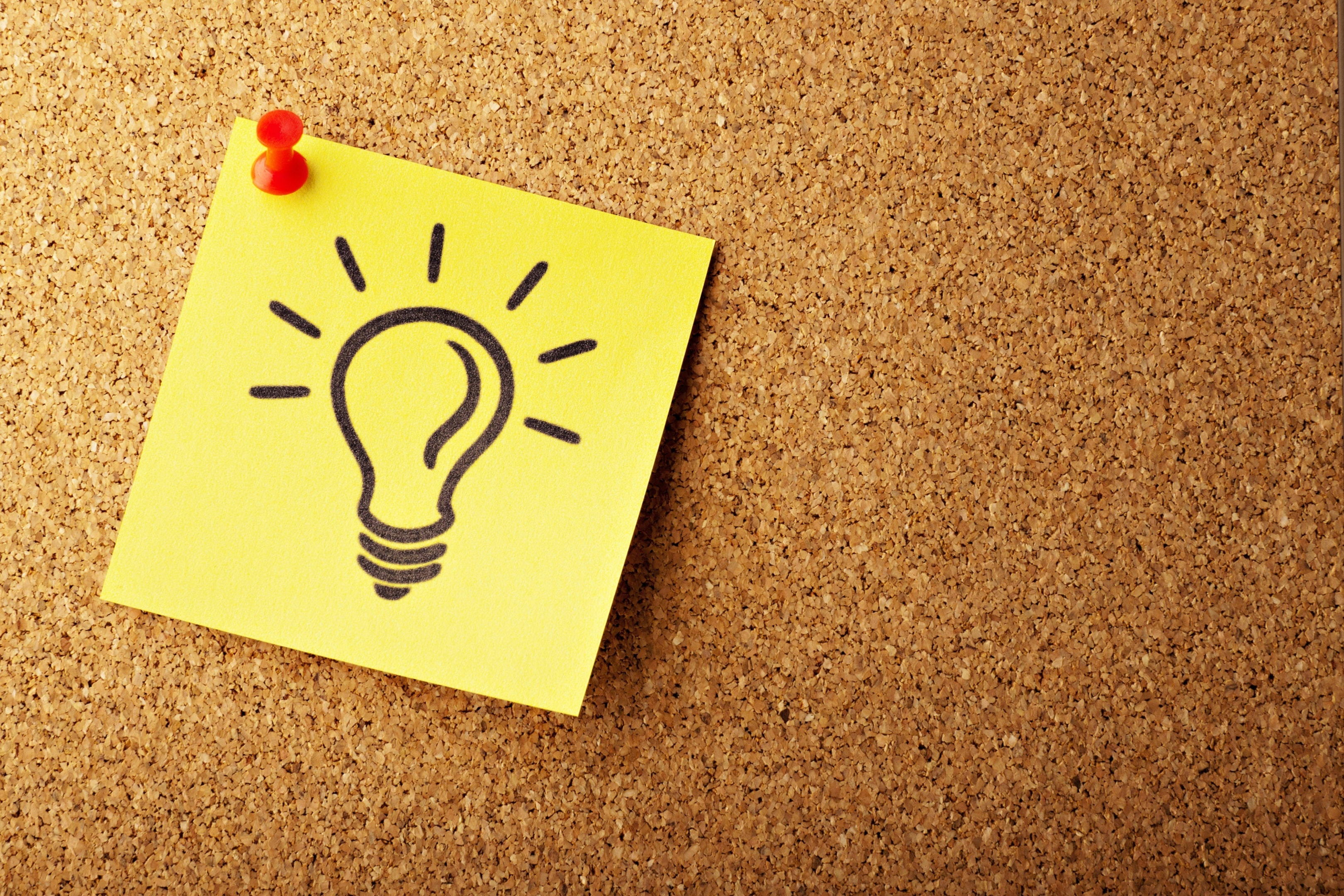 Lightbulb drawn on yellow post it note representing how motivated sellers are looking to problem solve. 