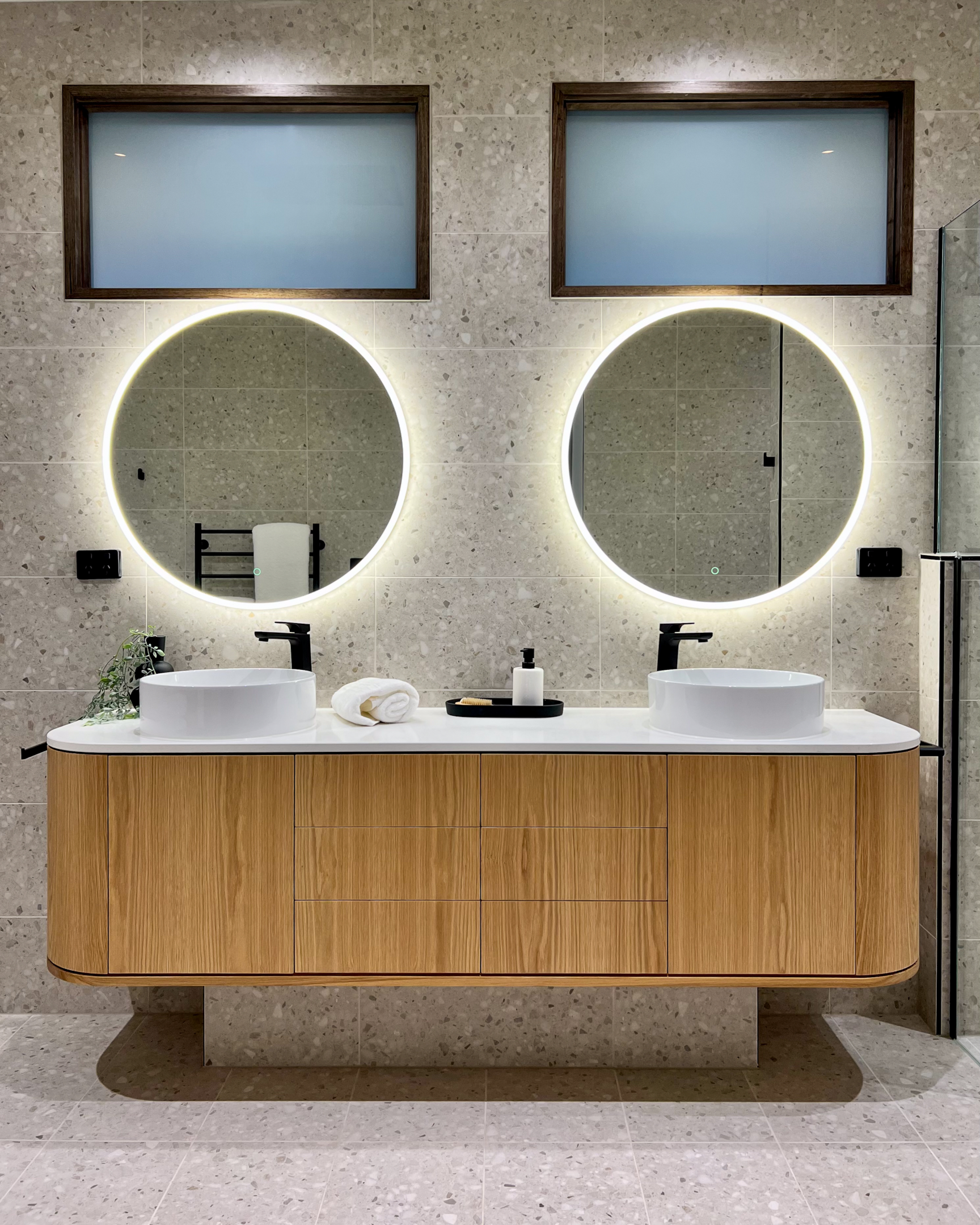 A beautiful Lomandra timber vanity located in a bathroom in Melbourne