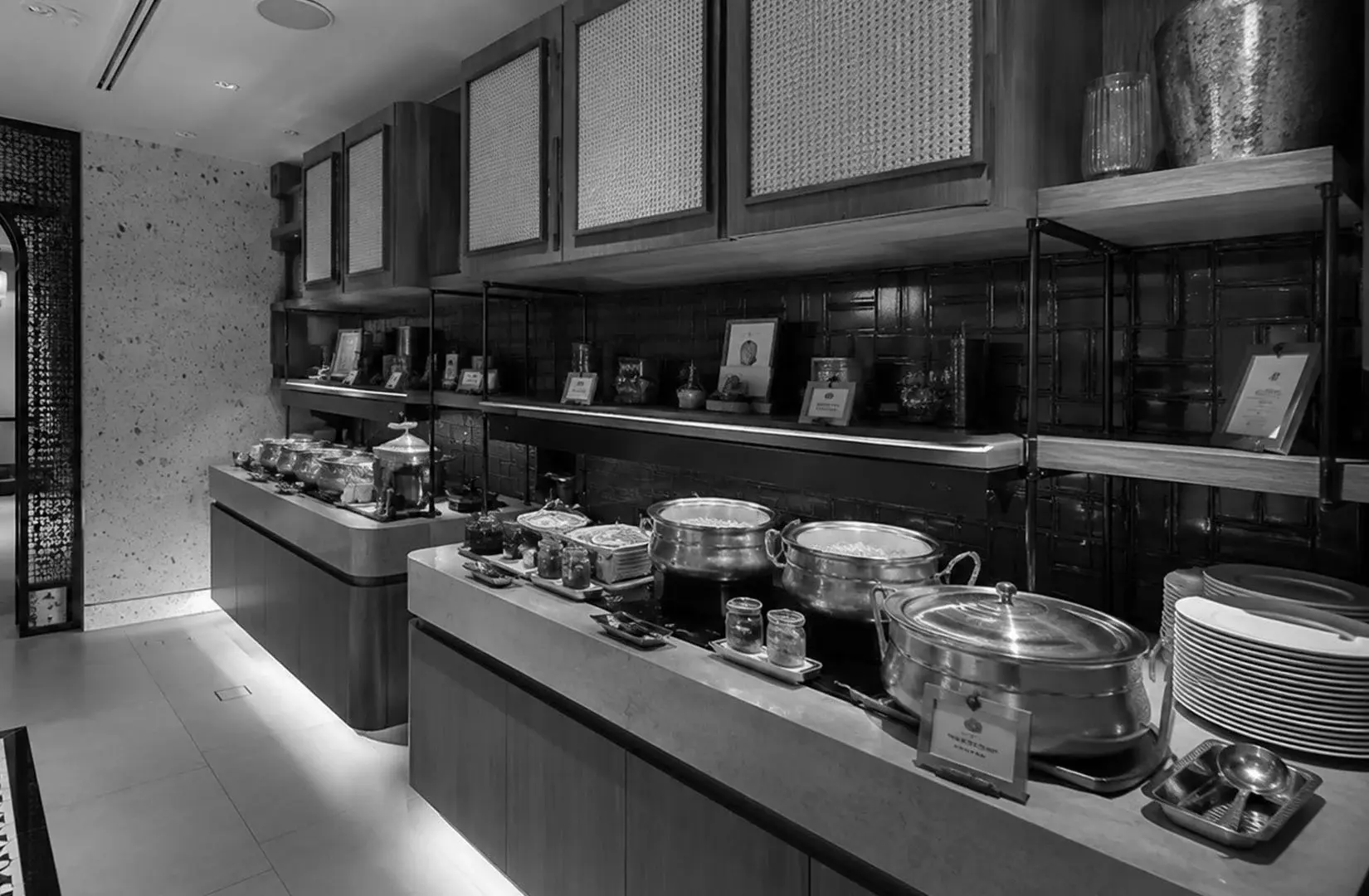 Estate buffet interior featuring a contemporary dining area with comfortable seating.