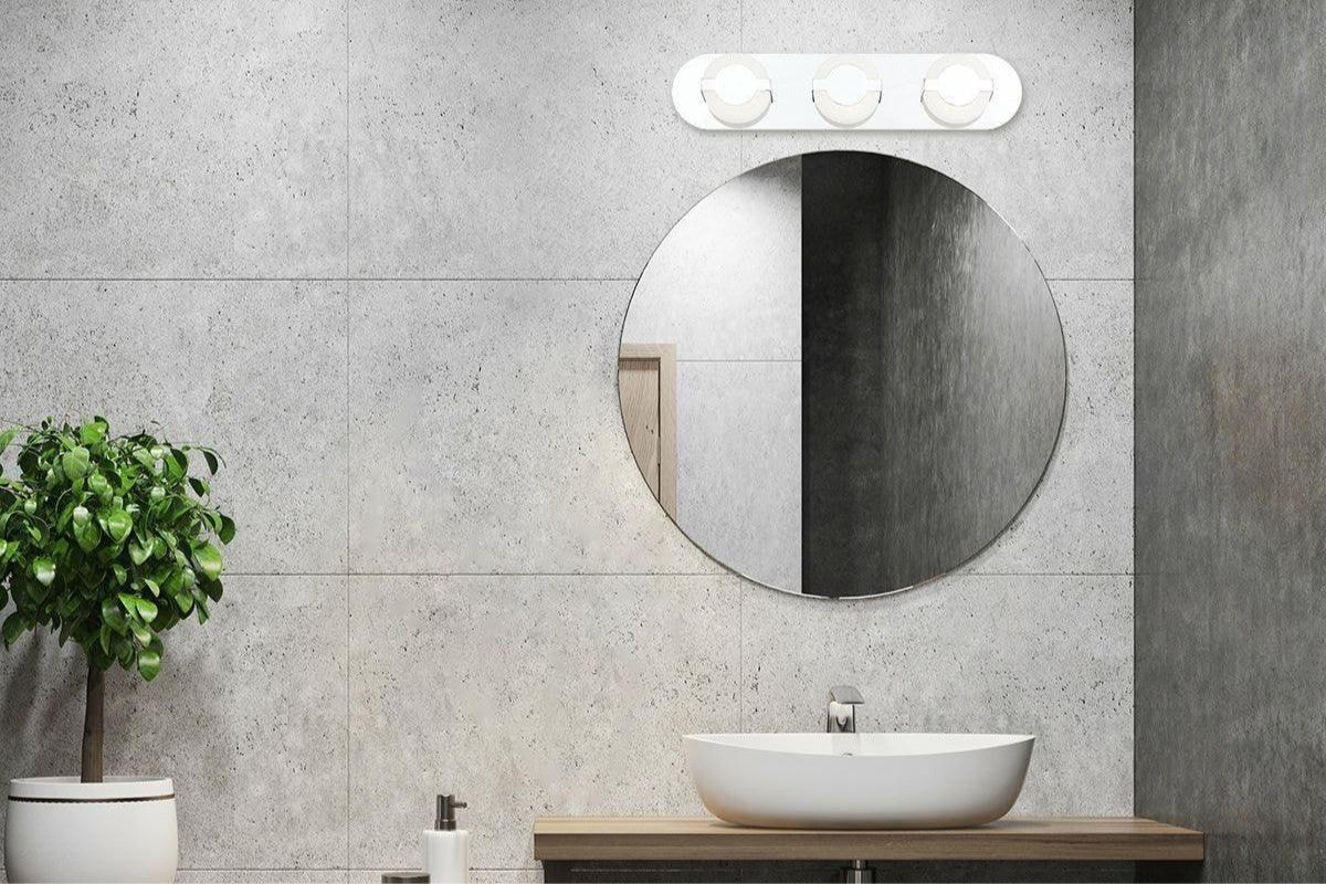 Balewood Vanity Light on wall above round mirror, a stylish bathroom vanity light product that adds interest at a great price.