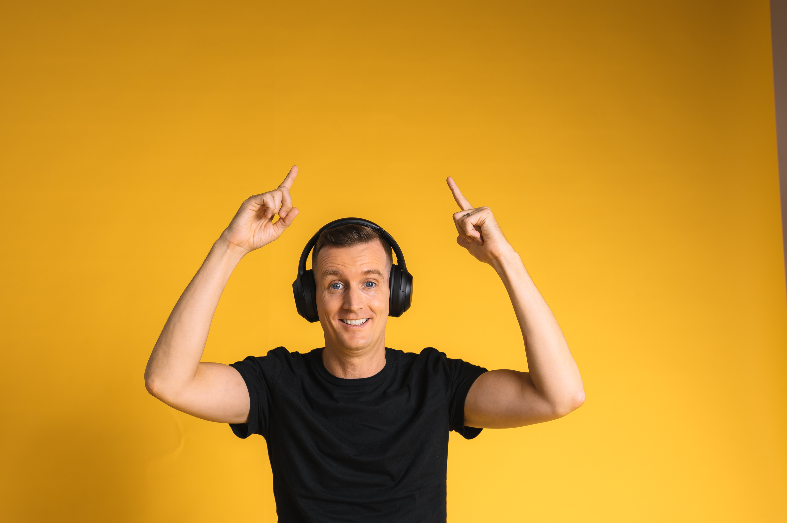 Why do Podcaster wearing headphones?