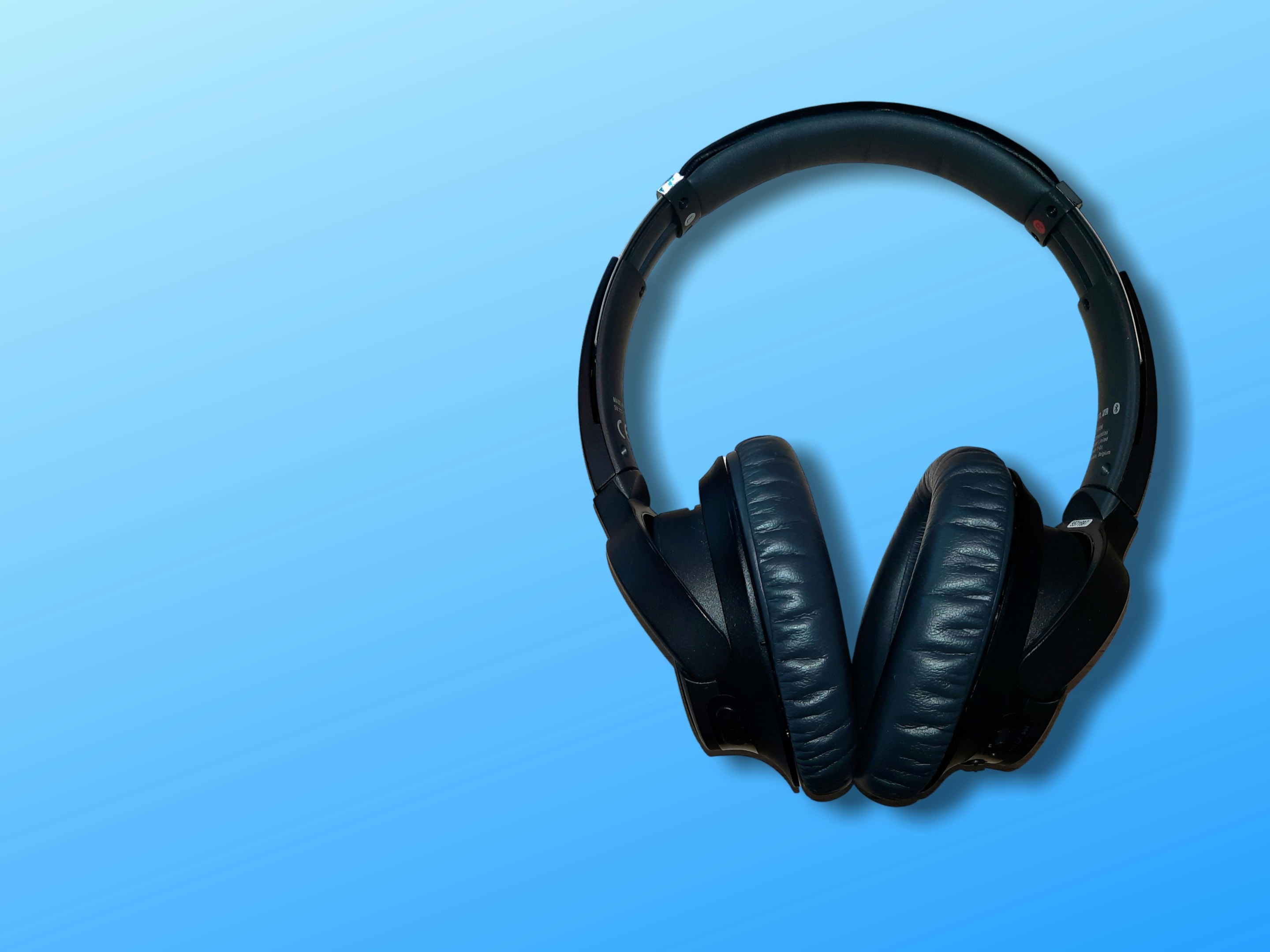 Headphones used to listen to a variety of real estate podcasts.