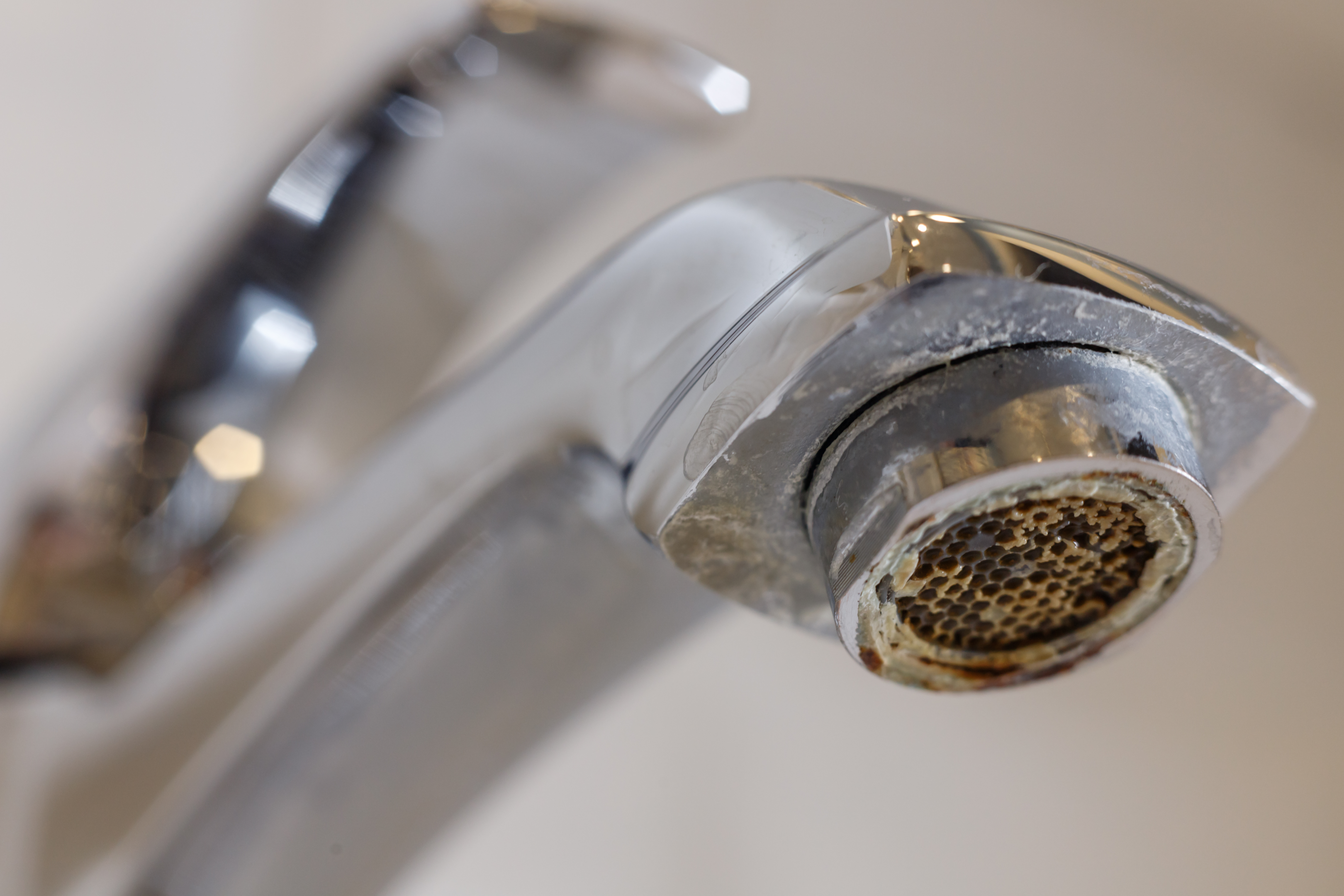 Scale buildup on a faucet