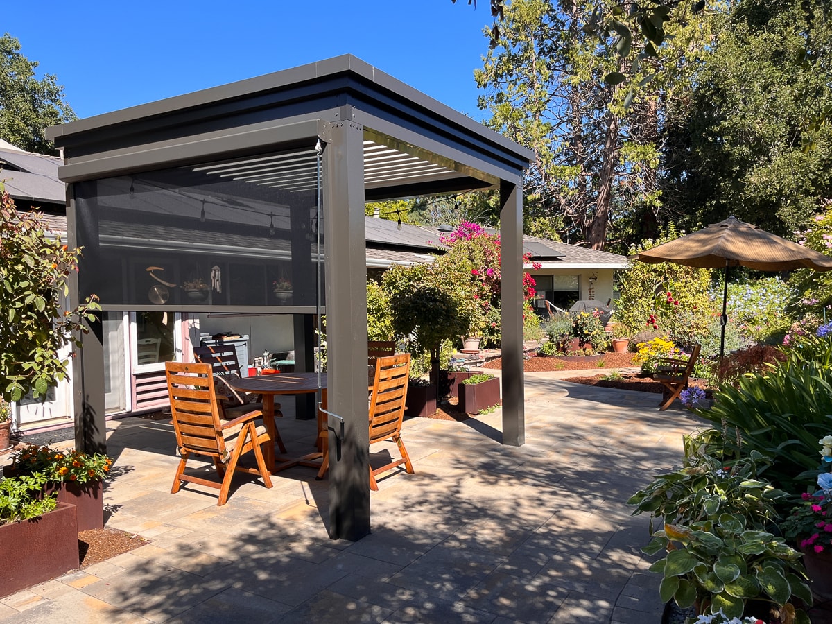 Shade installed on a freestanding pergola for extra shade and comfort.