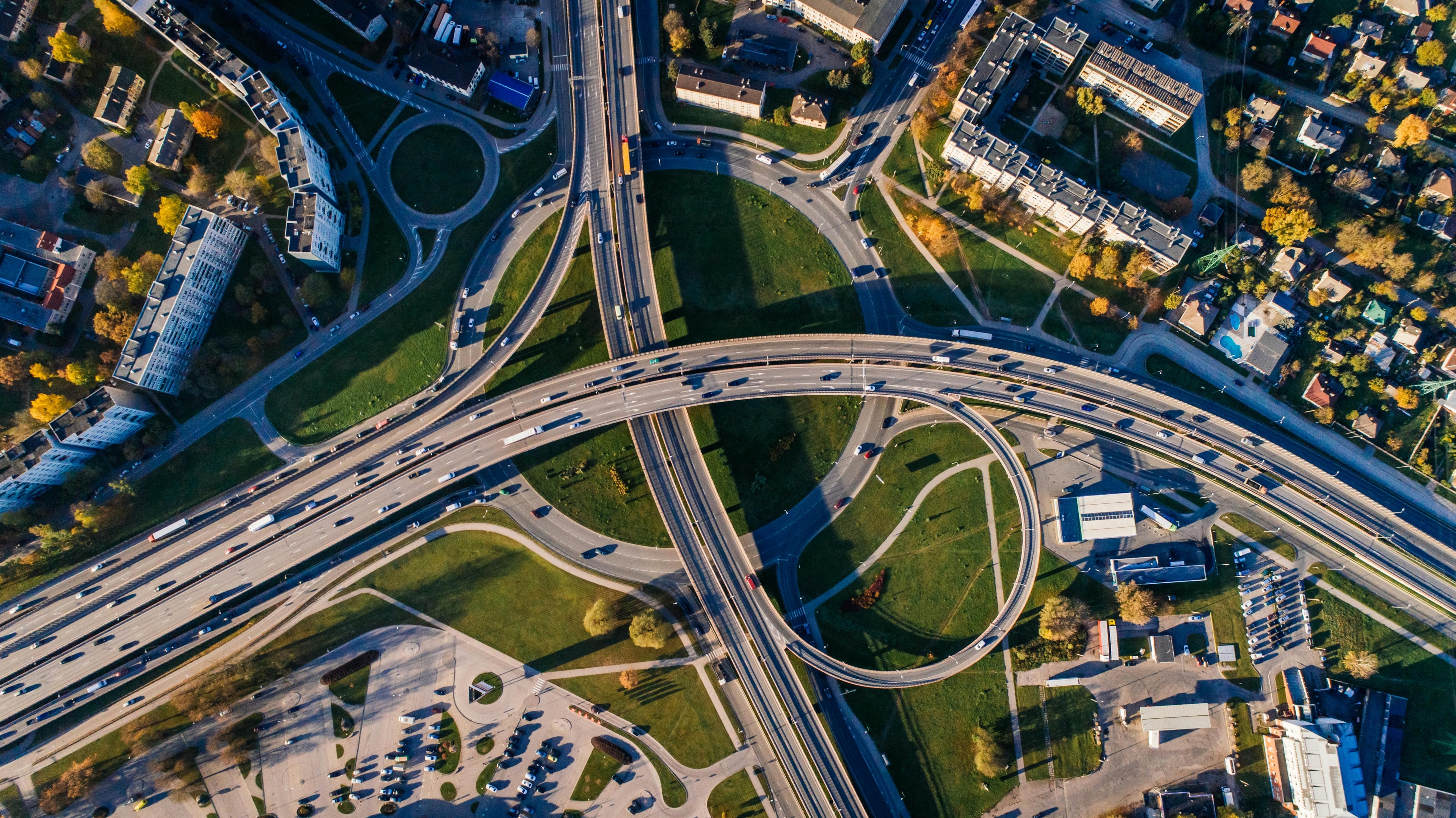 Aerial view of cars driving on intersecting highways.