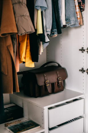 organized closet in primary bedroom