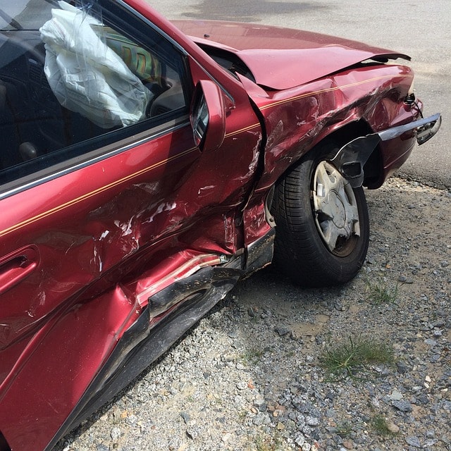 A Florida personal injury lawyer preparing legal documents for a civil court case involving severe injuries from a car accident.