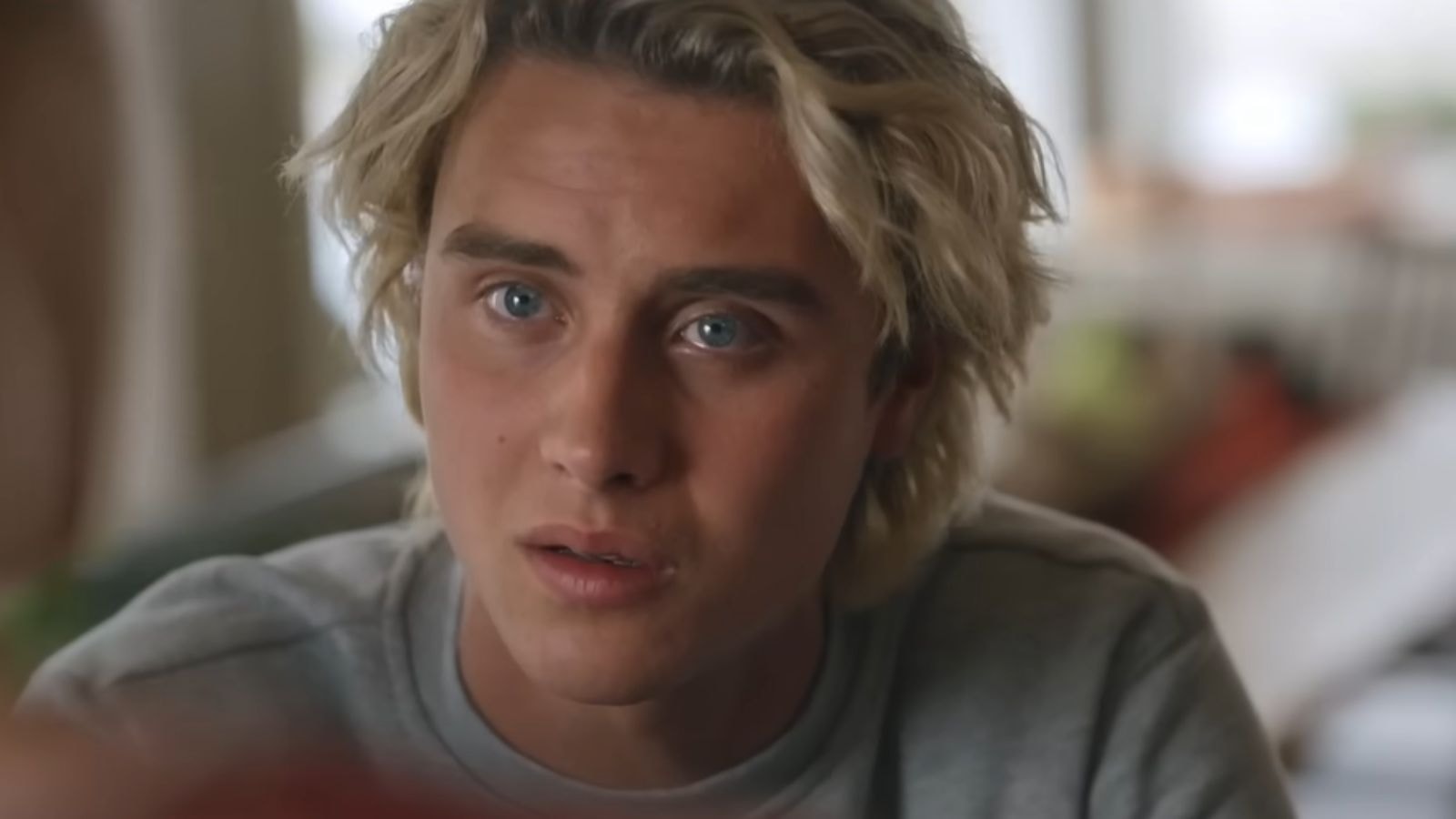 Joseph Zada as Johnny looks intently in We Were Liars Season 1