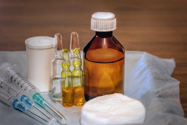 Medical supplies with syringes and medicine vials