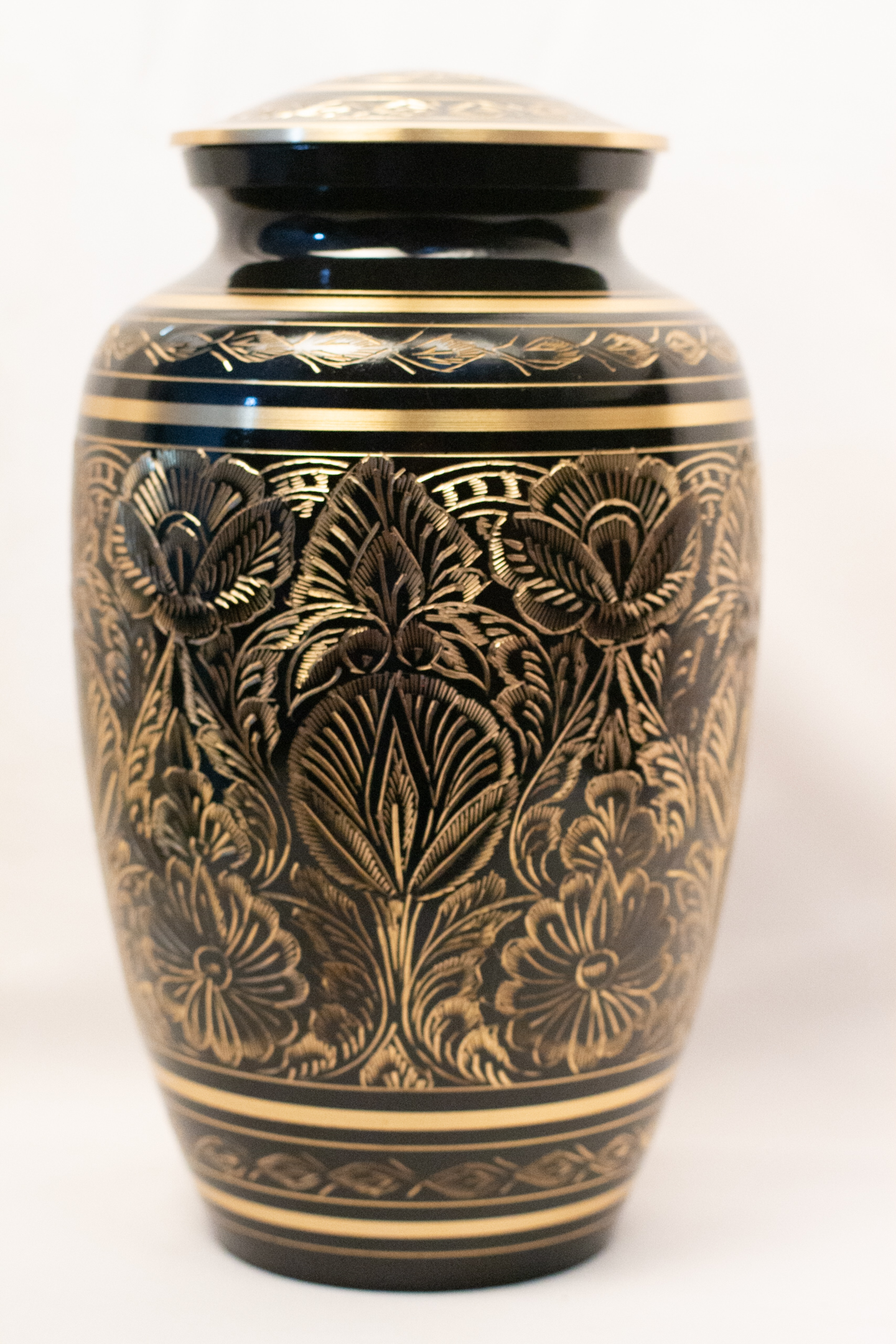 Brass urn with handwork by Reverie Memorials