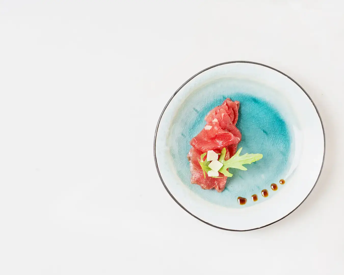 Minimal fine dining dish showcasing food presentation, visual identity, and F&B brand positioning
