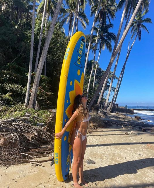 woman with inflatable paddle board