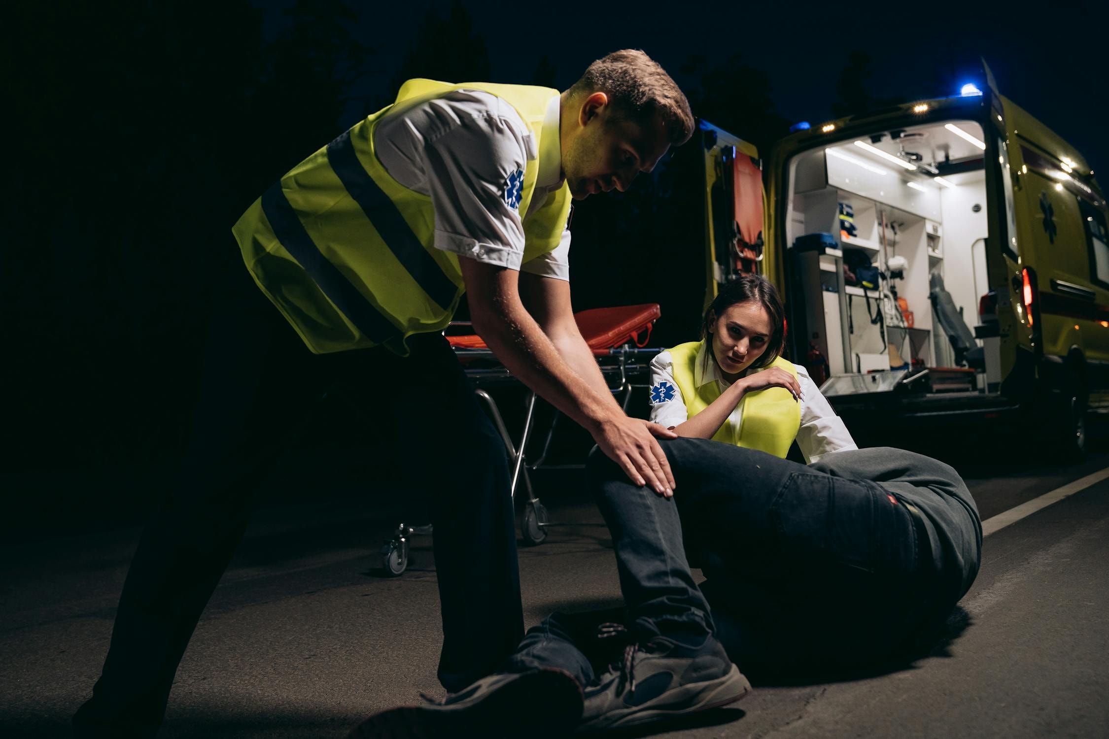 Injured person lying down on the ground