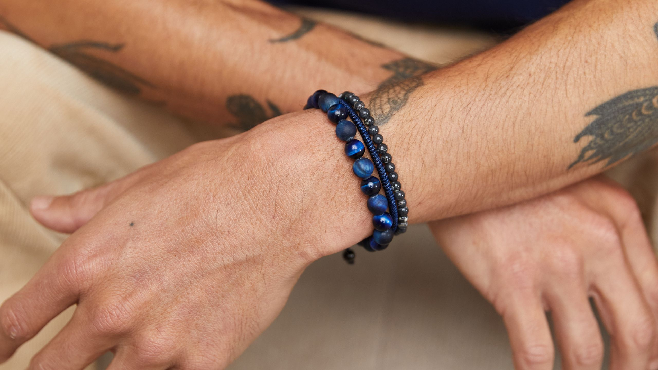 A Man's Guide To Wearing A Bracelet | When And How To Wear Men's Bracelets  | Mens accessories fashion, Big men fashion, Bracelets for men