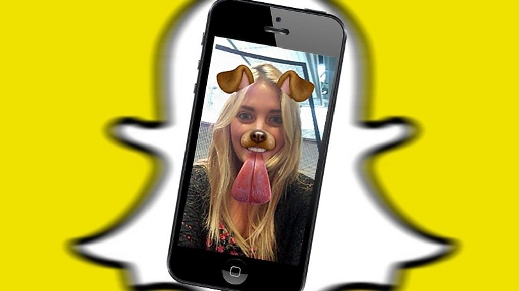 A woman sticking her tongue out on Snapchat