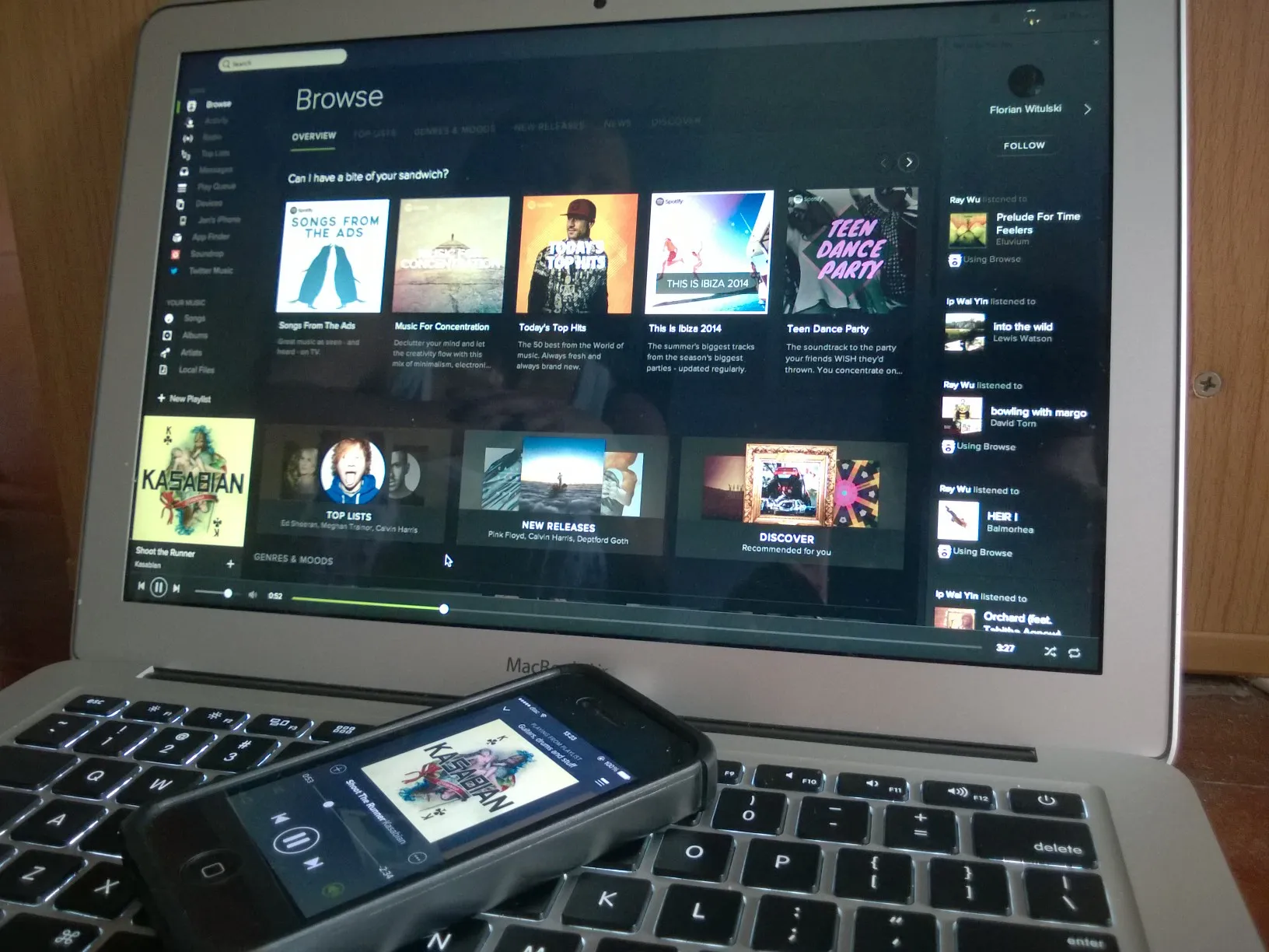A person using Spotify Premium on their laptop