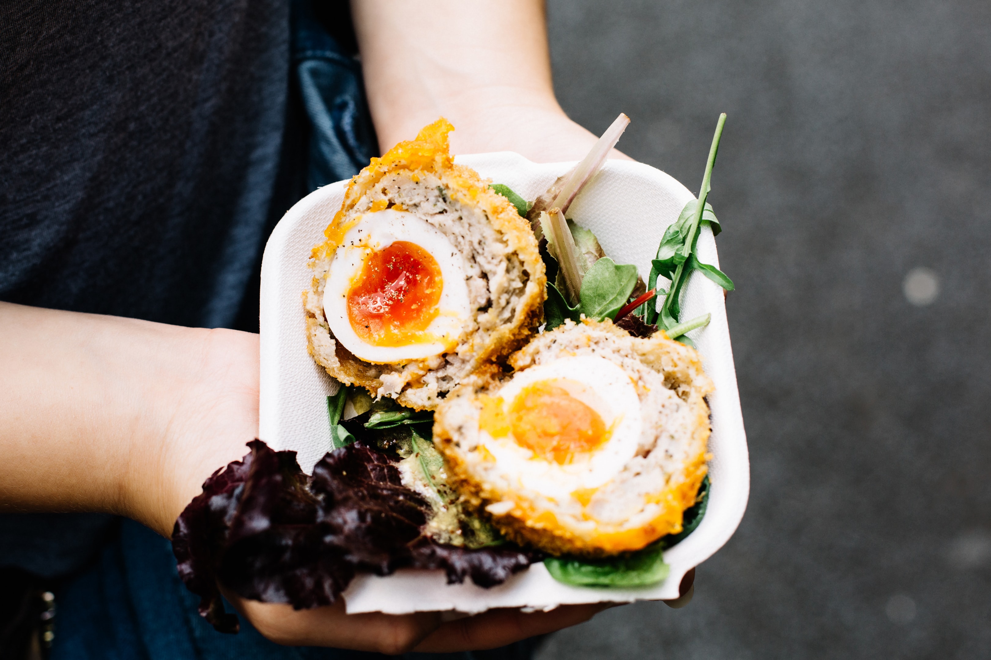 Scotch egg on a plate from a gastro pub.