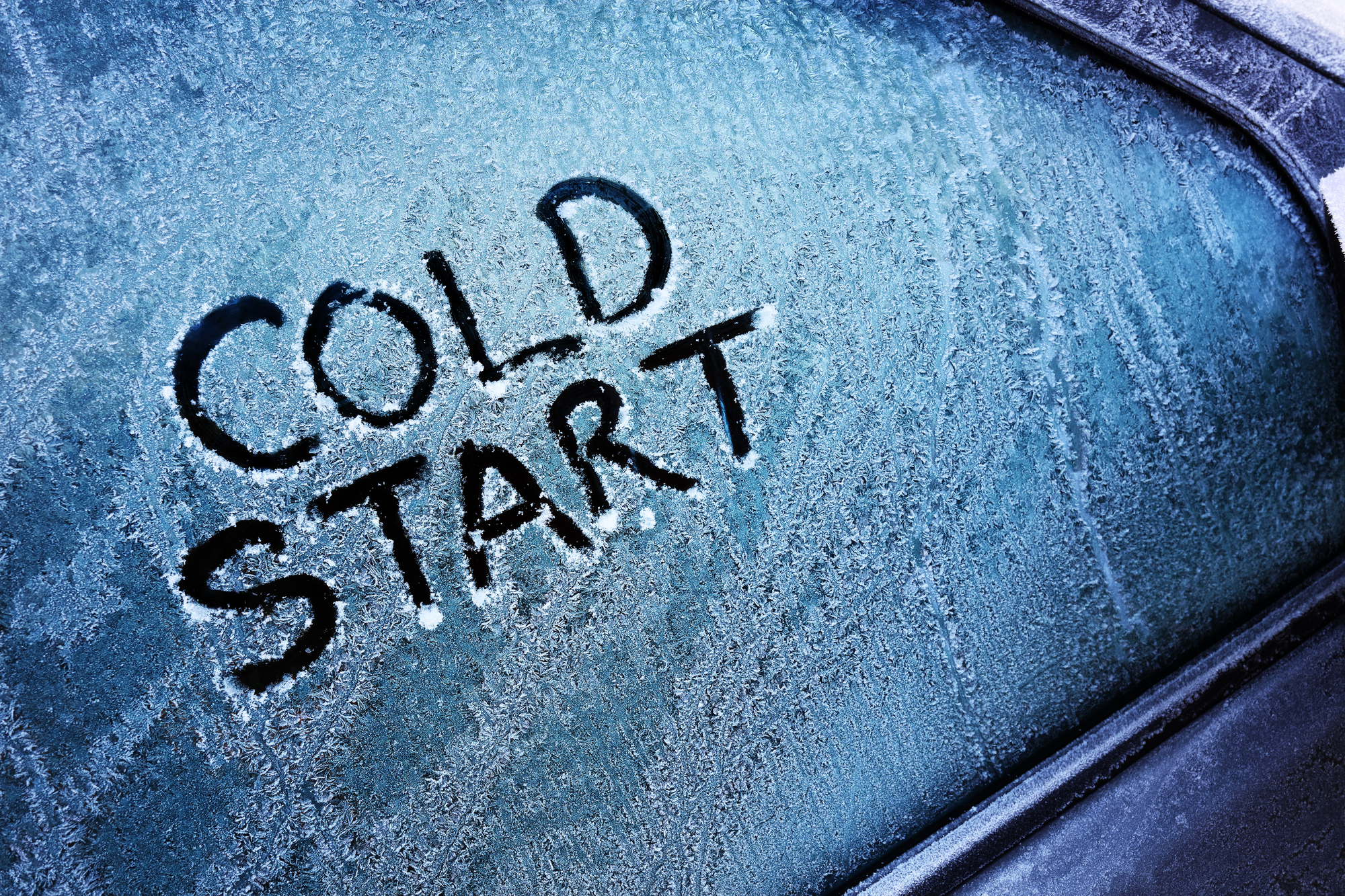 Cold start message on frozen car's window